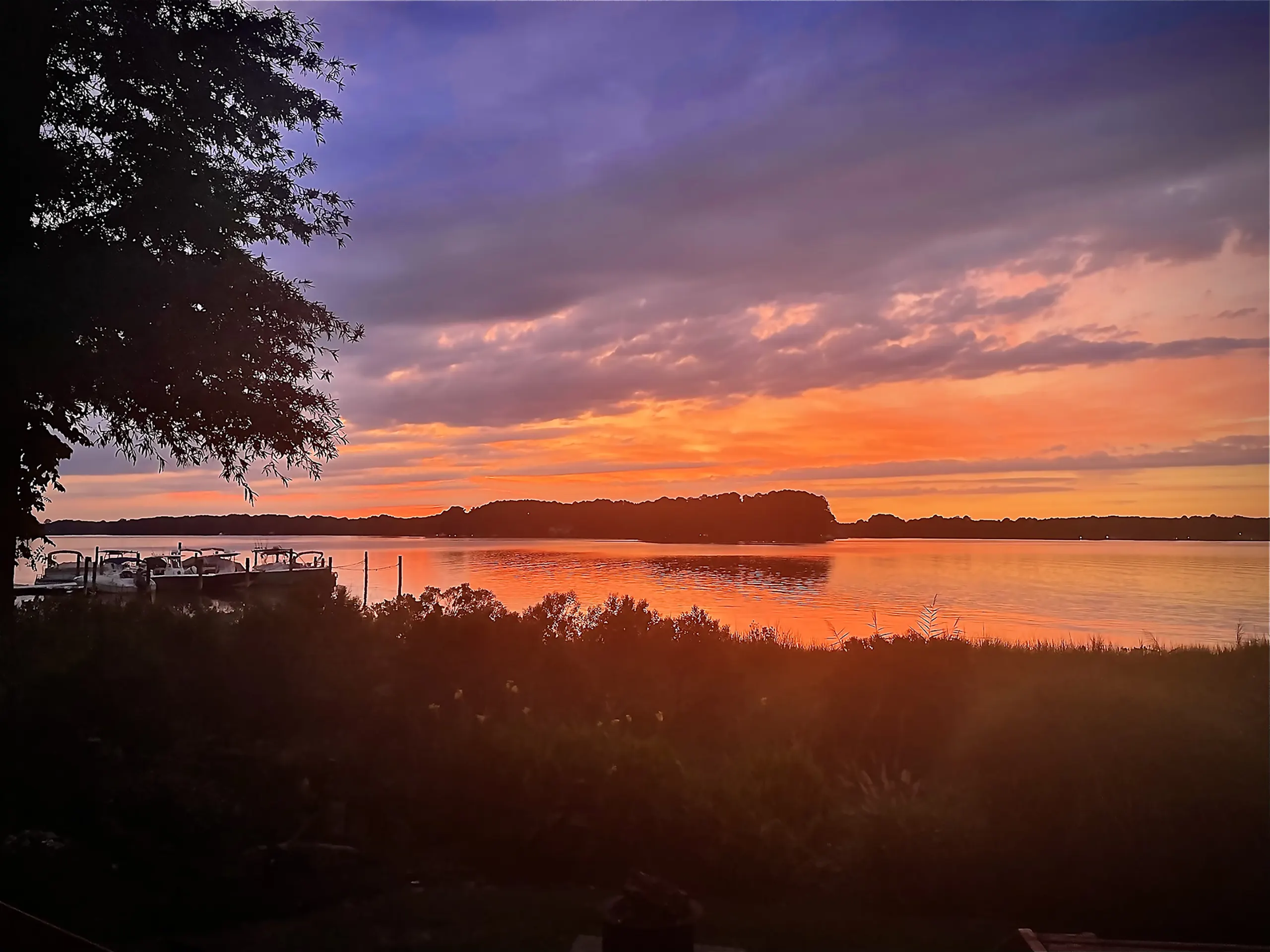 Sunset over the marsh and the docks